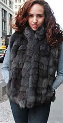 Marc Kaufman Furs Presents a gray fox fur diamond vest from Marc Kaufman Furs New YorkArgentinaUnited KingdomAustriaDenmarkNorwayAustraliaFinlandSaudi ArabiaOmanKuwaitJordanEgypt