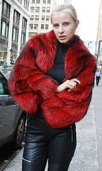 Marc Kaufman Furs Presents a dyed red silver fox fur jacket with bolero sleeves from Marc Kaufman Furs New YorkArgentinaUnited KingdomAustriaDenmarkNorwayAustraliaFinlandSaudi ArabiaOmanKuwaitJordanEgypt