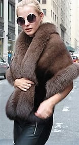 Marc Kaufman Furs Presents a brown mink fur stole with fox fur trim from Marc Kaufman Furs New YorkArgentinaUnited KingdomAustriaDenmarkNorwayAustraliaFinlandSaudi ArabiaOmanKuwaitJordanEgypt